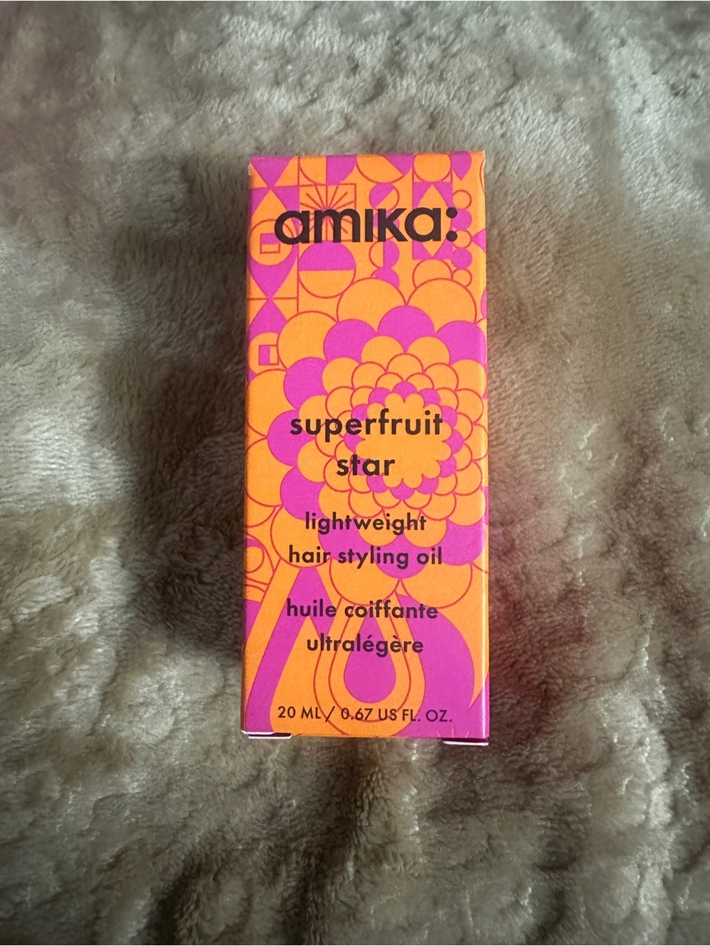 amika Superfruit Star Lightweight Hair Styling Oil — Pink & Orange Packaging